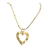The hollow double-layer heart-shaped diamond-encrusted pendant has a unique texture and a sweet and cool style. The stainless steel snake bone chain can be layered and worn, making it a trendy and exquisite jewelry for young girls Item Picture